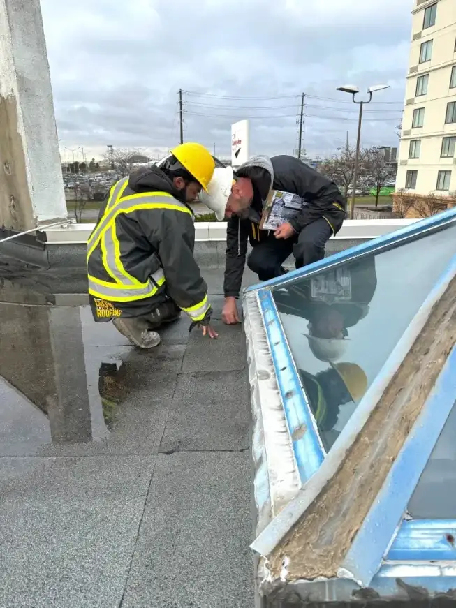industrial flat roofers work on apartment